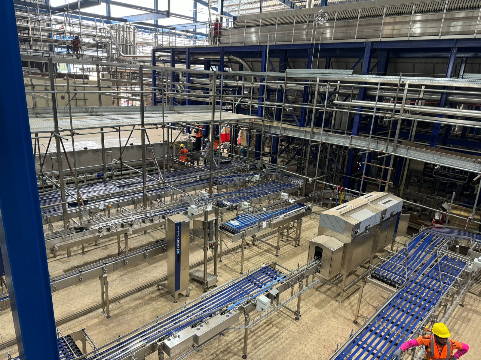 Production conveyor and facility service infrastructure